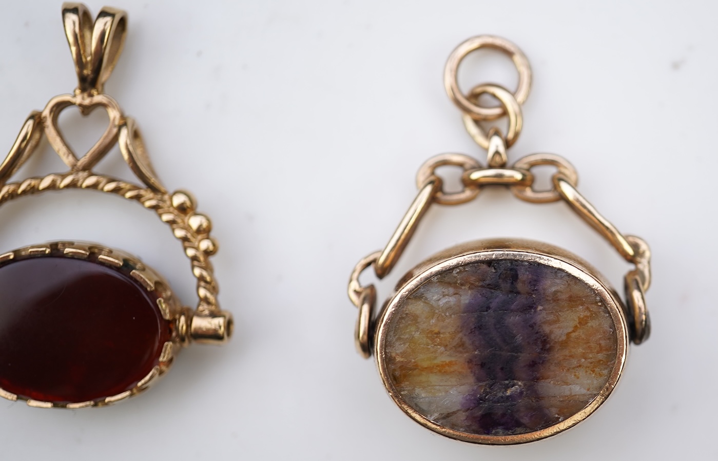 Three 9ct gold fob pendants